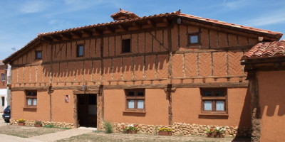 casa rural adobe façade